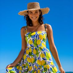 The Positano mini resort dress is sure to give you that “dolce vita” energy on vacation. This gorgeous lemon print mini dress is made with adjustable tie straps that can also tuck in for a strapless look. Shop resort dresses today. Kenny Flowers, Lemon Print Dress, Suit Measurements, Resort Dress, Summer Energy, Smaller Hips, Resort Dresses, Lemon Print, Long Kimono