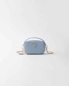 Zipper closure Enameled metal triangle logo Chain shoulder strap Logo-print nylon lining Prada Blue Bag, Blue Prada, Prada Mini, Prada Collection, Mini Pouch, Prada Saffiano, Fancy Bags, Mini Pouches, Wallet Pouch