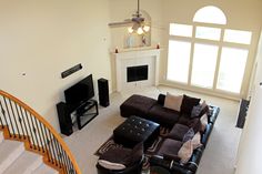 a living room filled with furniture and a fire place