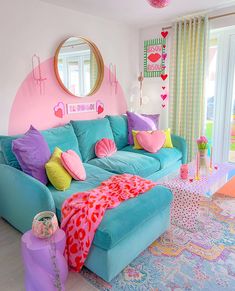 a living room filled with lots of colorful furniture