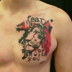 a man's chest with a lion tattoo on it that says fear not, i am with you