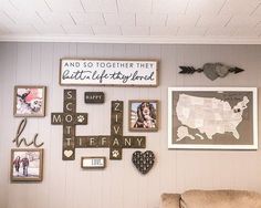 a living room filled with furniture and lots of pictures on the wall next to it