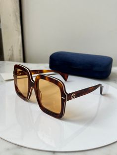 Brand new Gucci GG1241S 003 Havana Brown Sunglasses. Ultra oversized brown sunglasses in with white trim. Tinted yellow lens. Limited Edition. Size 56-23-145. Retail $535. Comes with Gucci jewel toned velvet case, cleaning cloth, satin pouch and authenticity cards. 100% authentic. Made in Italy. Luxury Gucci Shield Sunglasses With Tinted Lenses, Designer Brown Sunglasses For Summer, Gucci Brown Anti-reflective Sunglasses, Gucci Anti-reflective Brown Sunglasses, Gucci Brown Tinted Sunglasses, Gucci White Sunglasses With Uv Protection, Brown Gucci Sunglasses For Summer, Luxury White Gucci Sunglasses, Casual Brown Gucci Sunglasses