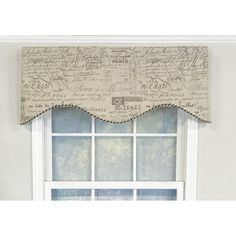 a window valance with writing on it