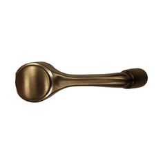 an antique brass door handle on a white background