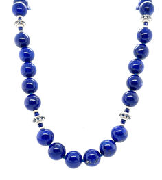 This gorgeous necklace of round lapis lazuli beads with sapphire and white gold accents is the epitome of style and sophistication! 10mm round, beautifully matched lapis with their high-polish and stunning royal blue color have been arranged with 18k white gold rondels, faceted blue sapphire beads and white gold rondels. The larger white gold rondels are set with tiny sparkling sapphires that complement the lapis perfectly, and the white gold accents have a lovely stardust finish. Classic Round Lapis Lazuli Jewelry, Necklace With 8mm Round Lapis Lazuli Beads, Lapis Lazuli Round Beaded Necklaces, Lapis Lazuli Necklace With 8mm Beads, Lapis Lazuli Necklaces With 8mm Beads, Sapphire Jewelry With 8mm Beads, Formal Lapis Lazuli Necklace With Round Beads, Formal Lapis Lazuli Beaded Necklace, Elegant Royal Blue Round Bead Necklaces