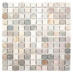 a white and grey mosaic tile wall