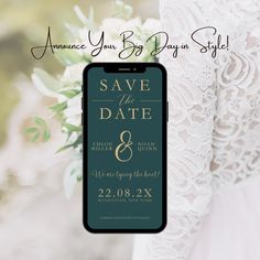 save the date and wedding announcement on an iphone with white flowers in front of it