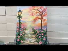 a painting of a path leading to a light post with flowers and trees painted on it