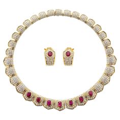 Van Cleef and Arpels Necklace and Earrings set with Ruby and Diamonds. French, Maker's Mark for Pery et Fils. The necklace weighs 87.60 grams with approximately 16 carats of Diamonds and approximately 10.50 carats of Rubies. Diamonds are all E-FG Color, VVS-VS Clarity. The Inner circumference of the Necklace is 14.25 inches and outer is circumference is 16 inches. The Earrings weigh 14.34 grams, and the length is 0.85 inches. Rubies weigh approximately 4 carats and diamonds 2.50 carats. Ruby Diamond Necklace, Ruby And Diamond Necklace, Van Cleef And Arpels Jewelry, Alexis Bittar Jewelry, Van Cleef And Arpels, Diamond Necklace Set, Van Cleef Arpels, Maker's Mark, Van Cleef