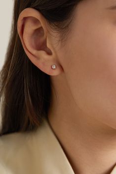 Simple and dainty, Andrea Fohrman's earring is the perfect set and forget style. It's handmade from 14-karat gold and has a 0.11-carat diamond - the traditional stone is believed to promote peace while protecting its wearer from negative energy. Stack yours alongside other pieces from the brand. Single Ear Piercing, Simple Diamond Earrings, Dainty Accessories, Simple Studs, Gold Bracelet Simple, Gold Diamond Studs, Andromeda Galaxy, Traditional Jewellery, Fashion Vocabulary