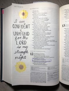 an open bible with the words i am confident unaaffaid as my strength is magic