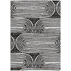 a black and white rug with wavy lines