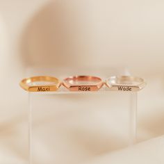 B A R ∙ S I G N E T ∙ R I N G * Material: High Quality Solid 925 Sterling Silver * Bar Dimensions: 3mm x 14mm * Finish: Sterling Silver ∙ 18K Gold ∙ Rose Gold * Personalized: Design can fit up to 14 characters and can be personalized with your own name, coordinates or messages. * All our work is custom made by hand with Love and Care in our workshop ♡ H O W ∙ T O ∙ O R D E R * Simply let us know the Name // Coordinates // Message and Font Number you would like in the 'PERSONALIZATION BOX' upon o Minimalist Personalized Stackable Open Rings, Minimalist Personalized Open Ring, Personalized Modern Stackable Rings, Modern Personalized Stackable Rings, Modern Personalized Adjustable Stackable Rings, Modern Personalized Stackable Rings For Promise, Personalized Modern Stackable Rings For Promise, Modern Personalized Stackable Promise Rings, Modern Personalized Rose Gold Rings