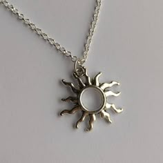 Sun pendant with your choice length silver plated necklace ● complete in gift bag  ● pendant size: 25x26mm Please select necklace length from drop down menu Necklace Sun, Necklace Aesthetic Silver, Sun Pendant, Sun Necklace Men, Sun Necklace, Metal Sun Design Necklace As Gift, Sun Pendant For Men, Sun Necklace Silver, Silver Sun Necklace