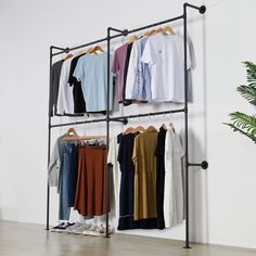 PRICES MAY VARY. INDUSTRIAL PIPE DESIGN - The clothing rack is designed to look great and is crafted from metal pipes, adding an industrial vintage style to your home or retail store. We designed this wall clothes rack to be really cool and eye-catching. STURDY AND DURABLE - This garment rack is very sturdy installed on solid wall. This item includes hardware to mount on concrete,tile walls or other types walls. OVERALL SIZE - 89.8in W*93in H*11.4in D EASY TO INSTALL & REUSABLE - All parts are d Messy Clothes, Industrial Loft Design, Industrial Clothing, Clothing Rack Display, Clothes Hanger Rack, Heavy Duty Clothes Rack, Hanging Clothes Racks, Pipe Decor, Shelves Wall