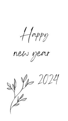 a black and white photo with the words happy new year written in cursive writing