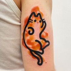 a woman's arm with a cat tattoo on the left side of her body