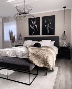 a large bed sitting in a bedroom on top of a hard wood floored floor