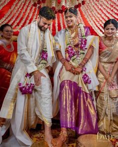 the bride and groom are posing for a photo