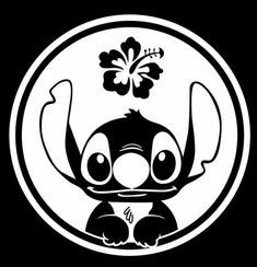 a black and white image of an elephant with a flower on its head in a circle