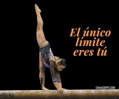 a woman doing a handstand on top of a balance beam with the words el unico limite eres tu