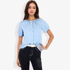 The Anna-Kaci Women's Short Sleeve Button Down Blouse with Gathered Neckline is a perfect addition to your everyday wardrobe. Crafted from soft, breathable fabric, this blouse features a gathered neckline and a button-down front that combine comfort with a touch of elegance. The short sleeves ensure a relaxed fit, making it ideal for warm weather or layering under a jacket. Whether you're running errands, enjoying a casual day out, or heading to a lunch date, this versatile blouse pairs effortle Light Blue Buttoned Tops For Work, Light Blue Buttoned Blouse For Work, Light Blue Short Sleeve Blouse With Buttons, Light Blue Short Sleeve Button Blouse, Light Blue Button Blouse For Work, Light Blue Button-up Blouse For Day Out, Light Blue Short Sleeve Blouse With Button Closure, Solid Buttoned Blouse For Day Out, Spring Light Blue Blouse With Button Closure