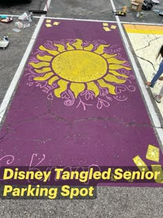 a purple and yellow parking spot with the words disney tangled senior parking spot on it