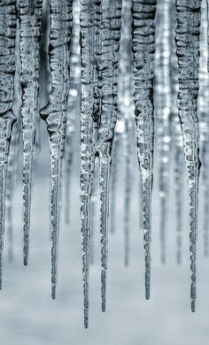 icicles hanging from the roof of a building