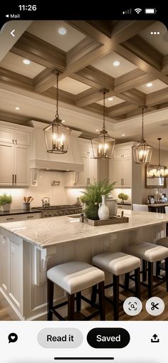 the kitchen is clean and ready to be used for cooking or eating, with stools at the island