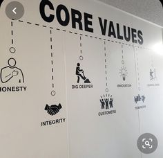 a sign on the wall that says core values and dig deeper, incertity