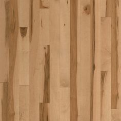 closeup of the wood grains on a wooden floor that is being used as a wallpaper