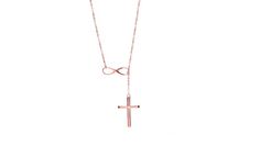 Lariat necklace with infinity and cross pendants Metal: sterling silver Plating: 18K yellow or rose gold Chain type: rolo Chain length: 18” Clasp type: spring Made in Italy Full dimensions: 18” (L) x 0.01” (W) x 0.04” (H) Elegant Rose Gold Sterling Silver Cross Necklace, Elegant Cross Lariat Necklace, Elegant Cross Lariat Necklace As A Gift, Elegant Adjustable Clavicle Chain Cross Necklace, Elegant Cross Lariat Necklace Gift, Elegant Cross Pendant Lariat Necklace With Adjustable Chain, Elegant Cross Lariat Necklace For Gift, Elegant Cross Lariat Necklace With Adjustable Chain, Elegant Cross-shaped Lariat Necklace With Adjustable Chain