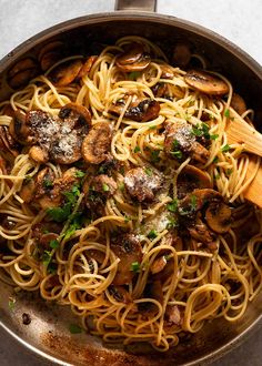 pasta with mushrooms and parmesan in a pan