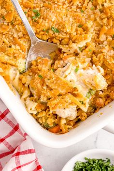 a casserole dish filled with chicken and rice