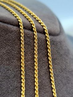 "--- Created in GURANTEED HIGH QUALITY 18K SOLID GOLD --- 18K Solid Gold Rope Chain Necklace / Yellow 18K Rope Chain Twisted for Men & Women - Pure Solid Gold- 19.5\" Length - Birthday Gift! Chain Length: 19.5, 21.5 and 23.5 inches Chain Thickness: 1.71 mm Closer: Spiring ring Style: Rope , Diamond-cut Simple and chic! Elegantly handmade! This perfect yellow solid gold chain necklace makes you become the center of attention. ** About 18K Solid Gold 18k solid gold pieces are made to last forever. Solid 18K gold jewelry is the most expensive and high quality option as it doesn't rub off or flake, and doesn't tarnish. Solid gold actually increases in value over time, and has the best resale value. 18K gold is richer and more vibrant in color. The 18k gold percentage is also less likely to tri Gold Rope Chain For Men, Wide Gold Ring, 18k Gold Chain, Gold Rope Chains, Rope Chain Necklace, Solid Gold Chains, Precious Jewels, 18k Gold Jewelry, Jewelry Stand