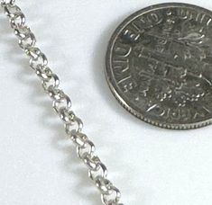 .87mm. Silver Plate on base metal rolo chain. Links are soldered SOLD BY THE FOOT...  If you purchase more than 1 foot your chain will come to you in one continuous piece. Links are 087mm round  Visit our etsy store: http://etsy.me/1W583sM FLAT RATE SHIPPING IN THE USA We ship your order out on the next business day.   As always and most importantly thanks for looking! If you need a larger quantity, please convo me I may have them on hand or can order them quickly for you.   Any Photos with a coin or jewelry is for design ideas and or references to size and detail and is not included in the listing price.  SHIPPING FLAT RATE SHIPPING IN USA....andCAN WE SHIP INTERNATIONALLY, TOO! Your order will be in the mail to you by the next business day.  As always and most importantly thanks for look Silver Rolo Chain Necklace, Metal Rolo Chain Necklace, Jewelry Chain, Chain Links, Chain Jewelry, Rolo Chain, Necklace Chain, Chains Jewelry, Base Metal