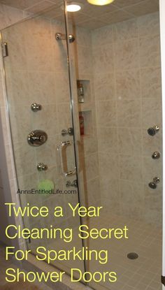 a shower with the words twice a year cleaning secret for sparkling shower doors on it