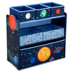 a blue toy chest with space and planets painted on the sides, along with two bins for storage