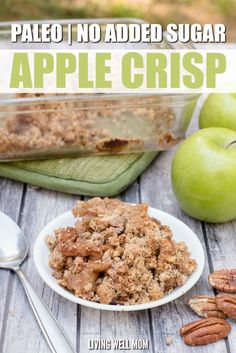 an apple crisp is served in a white bowl with pecans on the side and text overlay that reads, grain - free apple crisp