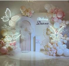 an image of balloons and flowers on display