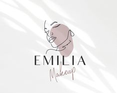 the logo for an artist's makeup brand, emila makeup is shown on a white background