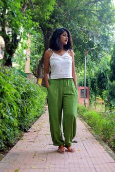 "Unisex Emerald Green pants for women, Custom made baggy linen pant, Bohemian pants, Made to order, Plus size Perfect for summer days.. goes well with cropped top.. Comfy baggy pants.. -Model height: 5'3\" wearing size S -Length: 36\" -Fit: Comfortable -Closure: Elasticated waist You can style these linen pants with casual tops or our tank tops. You would want to wear these everyday!" Baggy Pants For Women, Green Linen Pants, Bohemian Pants, Pants Model, Wrap Pants, Linen Pant, Linen Tank Top, Linen Tank, Cropped Tops