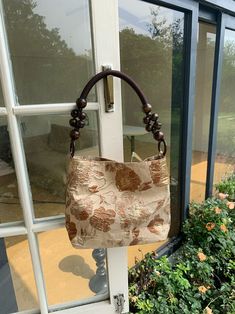 Features: Item: Elegant Retro Jacquard Shoulder Bags Handbags Material: Cotton & Linen Opening Method: Magnetic Buckle Inner Structure: Zipper Hidden Pocket Hardness: Soft Style: Daily Size: Medium（Height 21.5cm, Bottom Width 22.5cm, Handle Length 17cm） Brown Canvas Bag With Detachable Double Handle, Beige Pouch Shoulder Bag With Handles, Brown Satchel Canvas Bag With Detachable Handle, Beige Canvas Pouch Bag With Handles, Beige Pouch Bag With Handles, Beige Hobo Bag With Adjustable Handle For Shopping, Elegant Brown Canvas Shoulder Bag, Brown Canvas Bag With Detachable Handle For Everyday Use, Brown Shopping Bag With Adjustable Handle