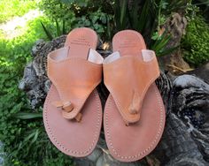 Women's comfortable and high quality sandals made from genuine cowhide leather. Available in brown, black, all black (insoles and outsoles are also black) and natural color. Strong and durable thong sandals also featuring stitched leather insoles and slip resistant rubber soles. Timeless sandals perfect for casual daily wear. The sandals in brown, black and natural are also available with soft padded insoles but the all black is not. Option available in color drop-down box. Please check below fo Summer Casual Leather Flip Flops, Leather Flip Flops For Everyday Summer Use, Natural Leather Flip Flops For Vacation, Natural Leather Flip Flops With Leather Sole, Casual Leather Toe Ring Sandals In Natural Color, Natural Leather Open Toe Flip Flops, Natural Leather Toe Ring Sandals With Leather Footbed, Adjustable Leather Toe Ring Sandals In Natural Color, Natural Leather Toe Loop Huarache Sandals