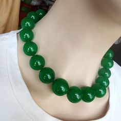 "Candy Green Jade Smooth Round Beads Necklace 16mm/18 mm Gorgeous Jade Beads MEN'S WOMEN'S NECKLACEE Bracelet  Green Jade Round Beads about 16mm/18mm mm.Necklace with Strong clasp. Necklace length 16\"18\" 24\" 32\" 36\" optional. Bracelet length about 8\". The Price for One pieces Necklace or Bracelet as you Choose。 Item come with colorful silk jewelry bags in random color. The photo was taken in the sun or sun light. Please verify your address when checkout. We are not responsible for any wron Jade Necklaces With Large Round Beads, Large Jade Bead Jewelry, Silk Jewelry, Round Bead Necklace, Clasp Necklace, Sun Light, Jade Bracelet, Jade Beads, Green Jade