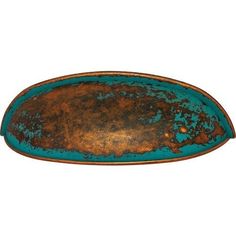 an oval metal tray with rusted pattered blue paint on the bottom and sides