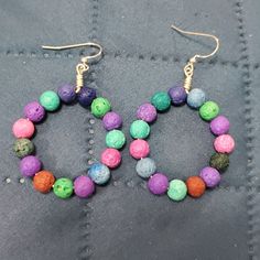 Made With Multicolor Lava Beads- Non-Tarnish Silver-Plated Wire+ Ear Wire. Measurements:2 X 1.25 Inches. Make Me An Offer. If It's Reasonable I'll Work With You! Rainbow Round Beads Jewelry With Ear Wire, Multicolor Hoop Earrings With Ear Wire, Colorful Circular Jewelry As Gift, Handmade Multicolor Small Hoop Jewelry, Multicolor Hoop Earrings With Ear Wire For Gifts, Multicolor Hoop Earrings With Ear Wire As A Gift, Nickel-free Multicolor Hoop Earrings, Colorful Handmade Small Hoop Jewelry, Handmade Colorful Hoop Jewelry