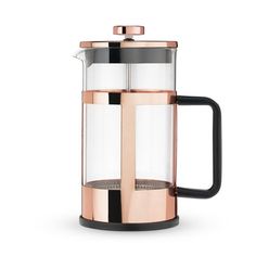 a french press coffee maker with a black handle and rose gold trim on the top