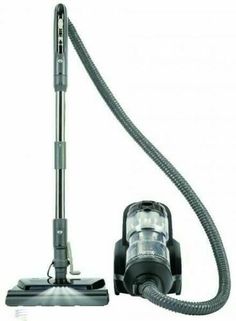 a vacuum cleaner is shown with its head on the floor and it's hose attached to